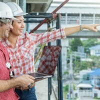 happy professional construction engineers working with corporate colleagues teamwork 200x200 - Home