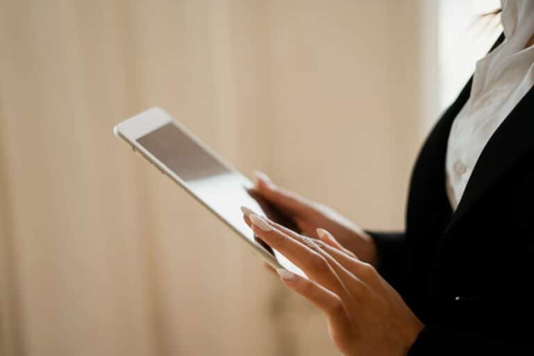 uses tablet woman formal suit online training video call remote workplace in office 768x512 - Team